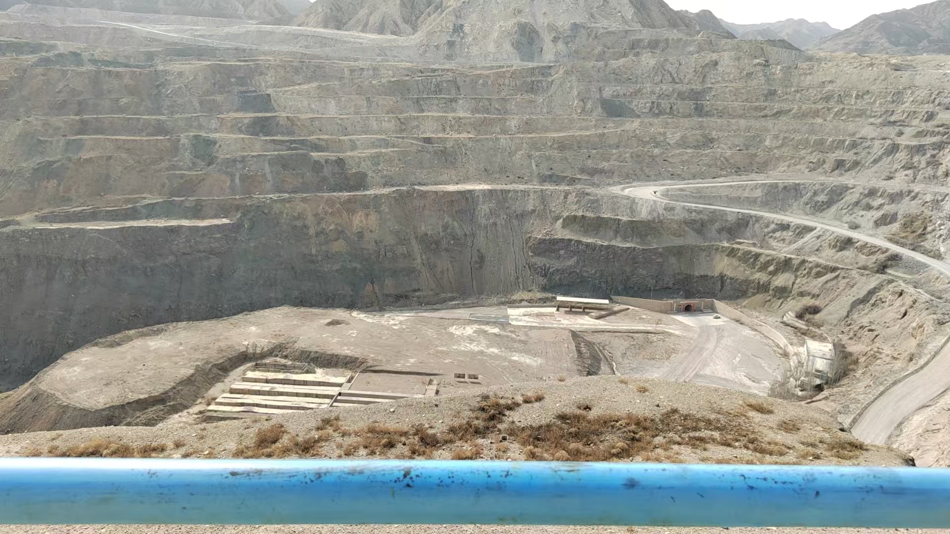 Open-pit mine where AI systems predict ore grade using hyperspectral imaging and sensor data
