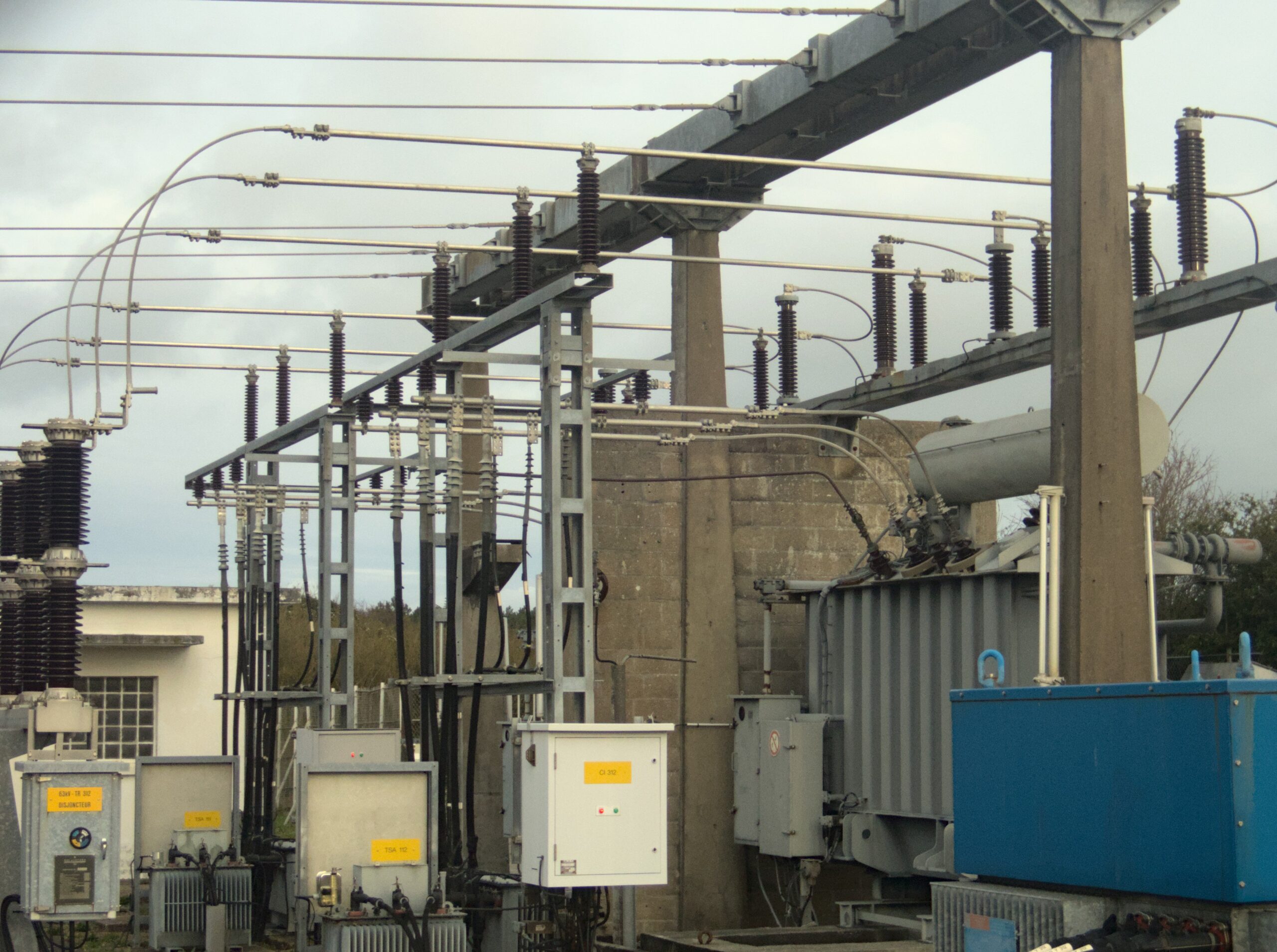 High-voltage power transformer connections at a substation used for AI failure prediction