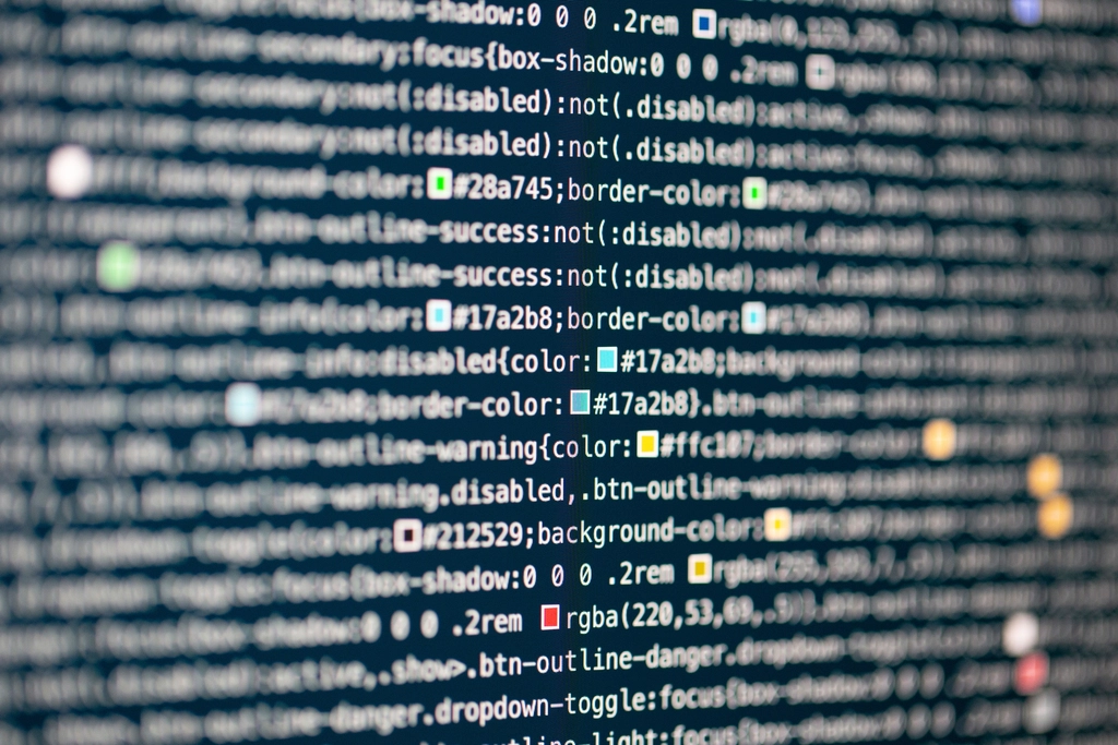 Replit revenue and business model concept, software code on screen