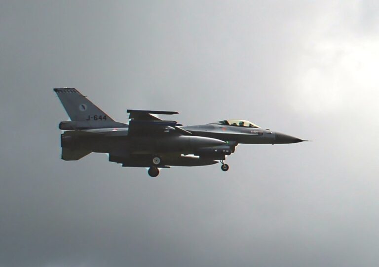 An F-16 fighter jet in flight, the aircraft type used in the AI-controlled F-16 VENOM test flights
