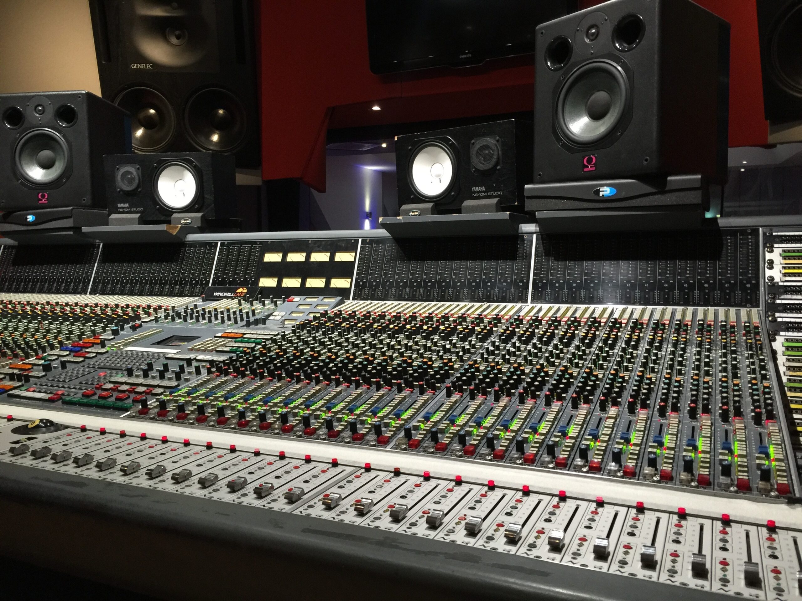 Recording studio mixing console, illustrating the debate over AI music on the Billboard charts