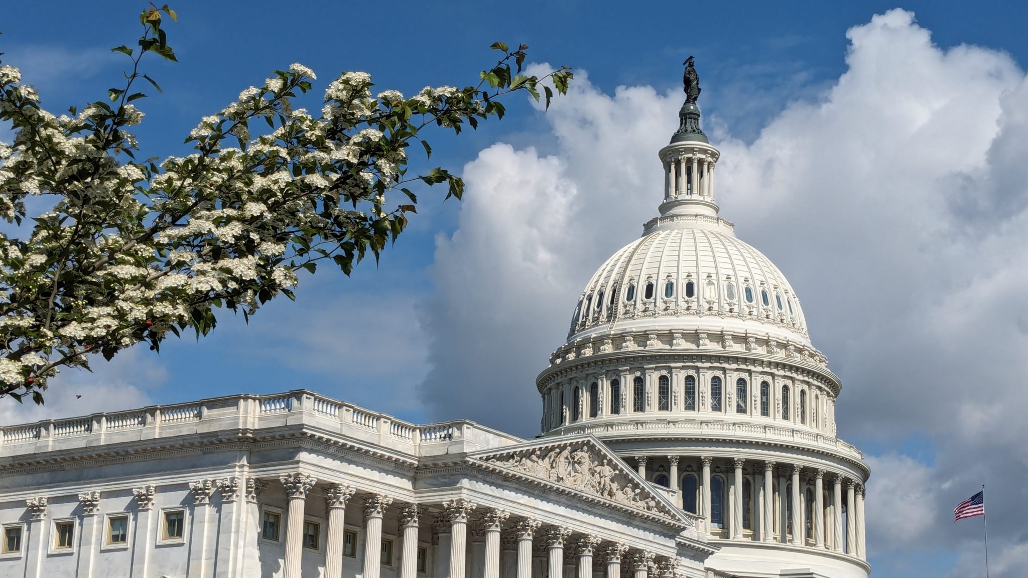 The United States Capitol dome against a blue sky, where lawmakers have proposed a superintelligence ban on advanced AI